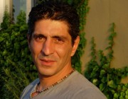 Aydoğan Oflu kimdir?