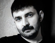 Erdal Acil kimdir?