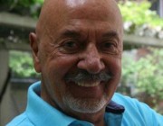 Erkan Yolaç kimdir?