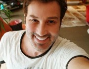 Metin Arolat kimdir?